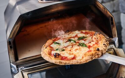 Hvordan steke pizza i forskjellige typer ovner